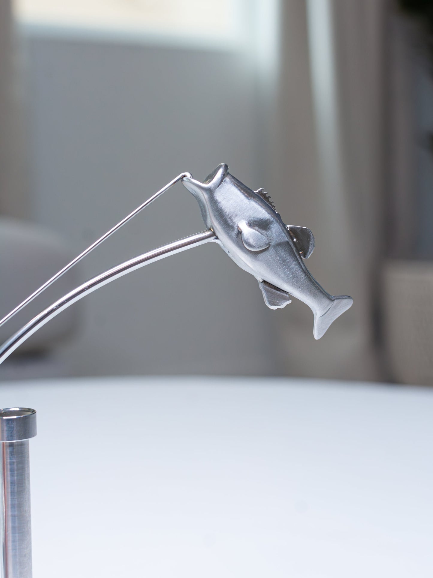 🎣Den balanserende fiskerskulpturen