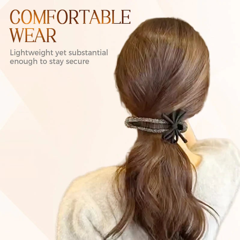 Glitrende elegant svart sløyfehårspenne